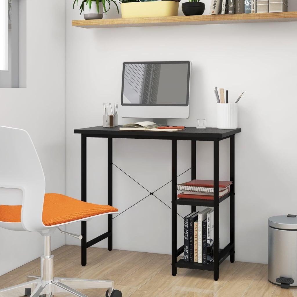 A black computer desk with a monitor, books, and a chair in a room.