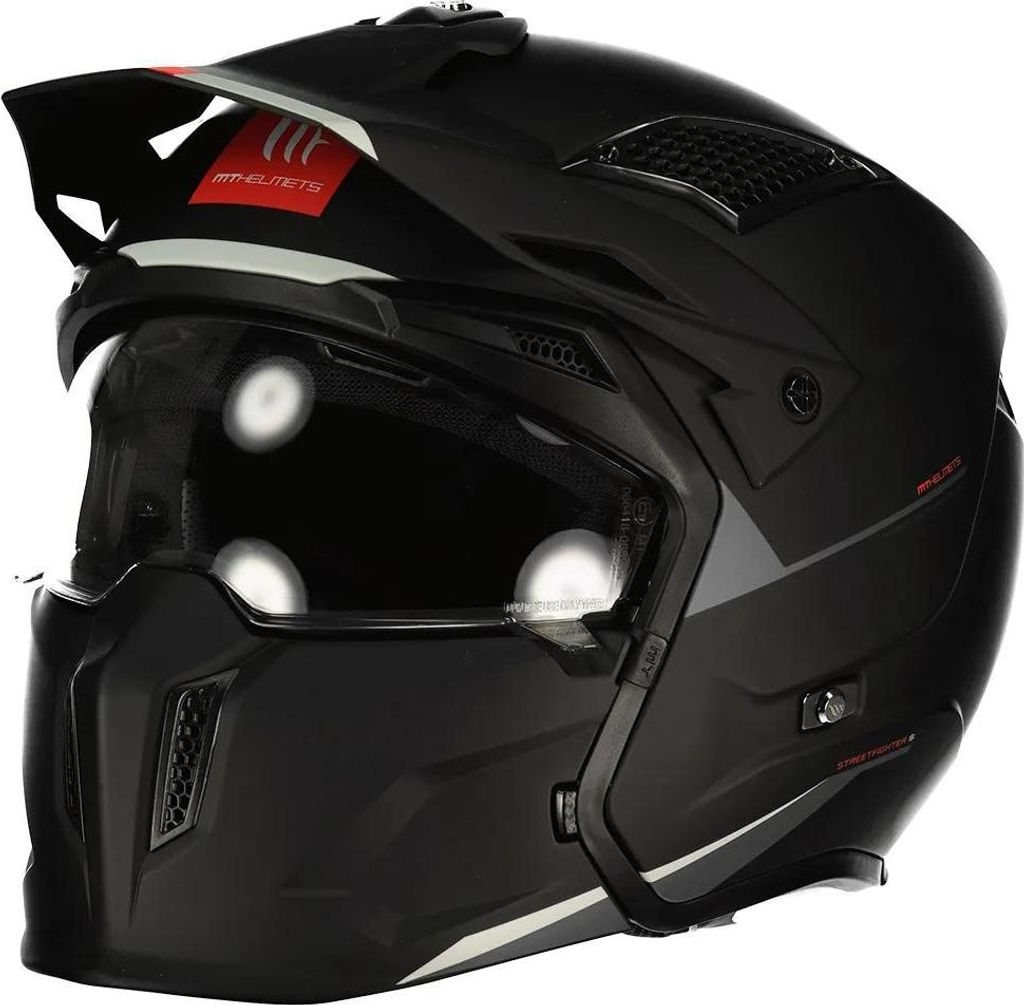A black motorcycle helmet with red and white accents, shown from a front-side angle.