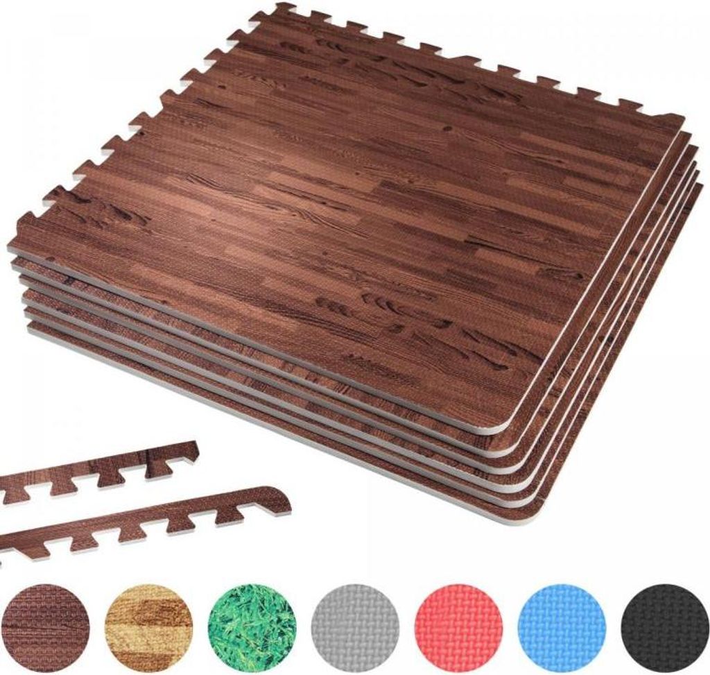 A stack of interlocking foam floor mats with a dark wood grain pattern, along with several smaller edge pieces and circular swatches of different mat colors and textures.