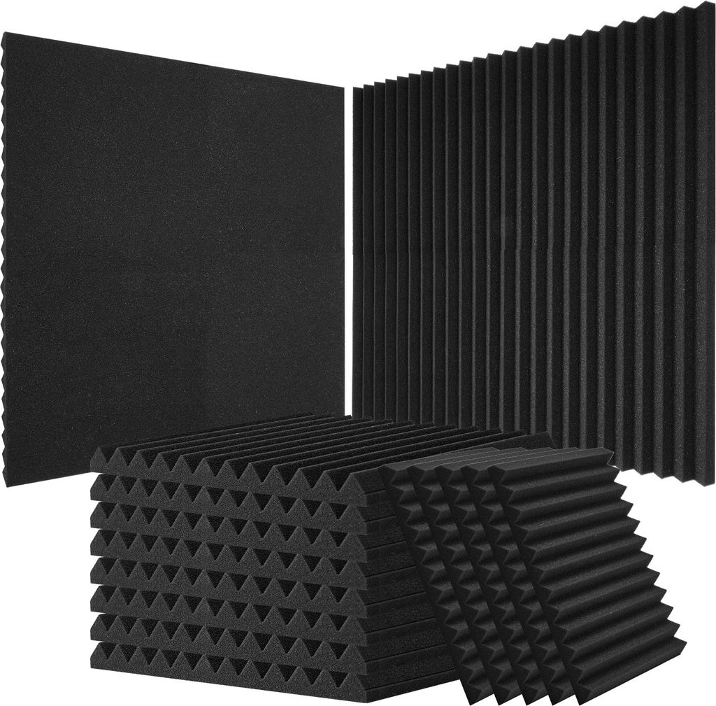 A collection of black acoustic foam panels arranged in a pile and standing upright.