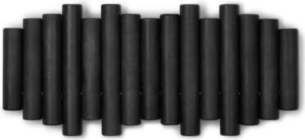 A row of black cylindrical hooks mounted on a white background.