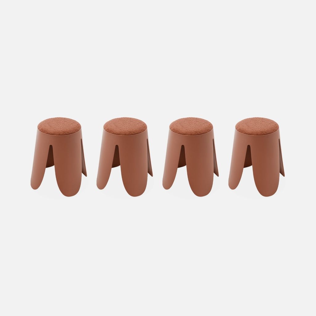 Four brown stools are lined up against a light gray background.