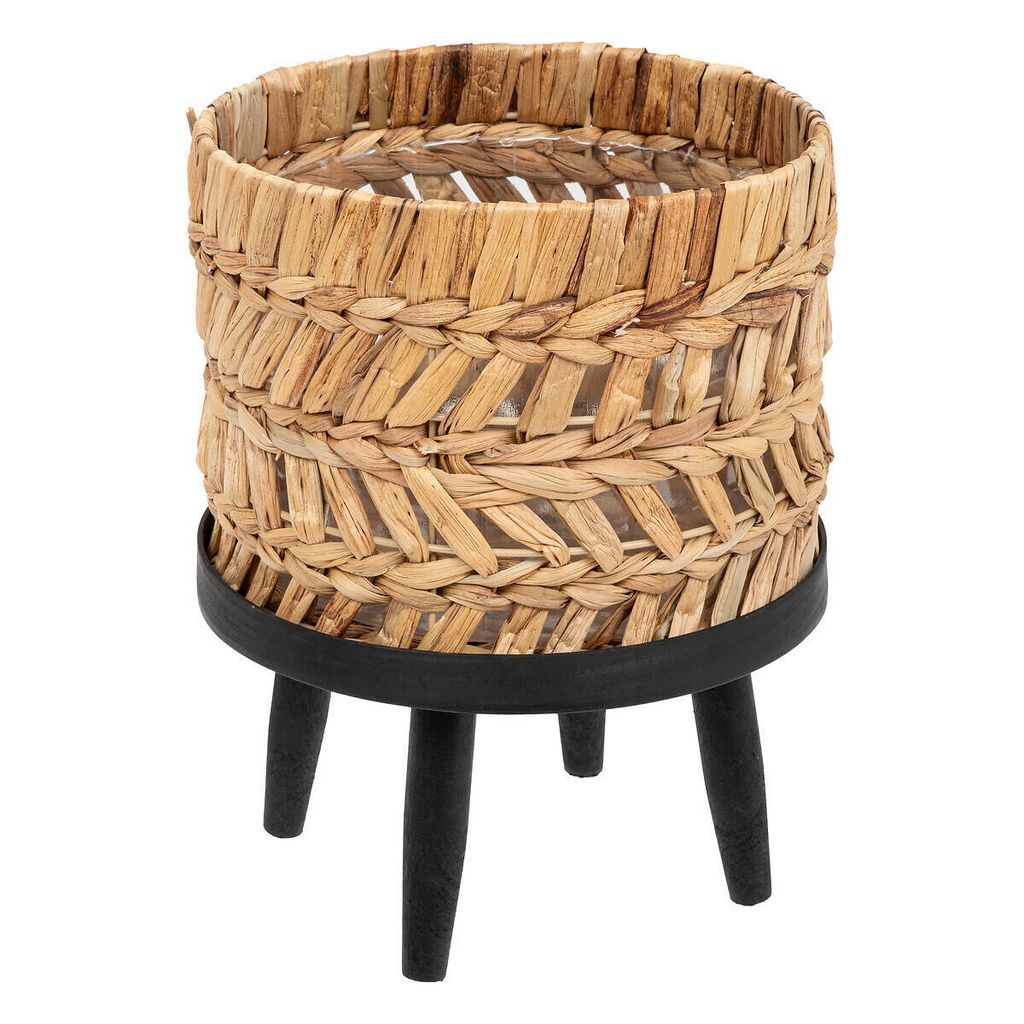 A woven planter on a stand.