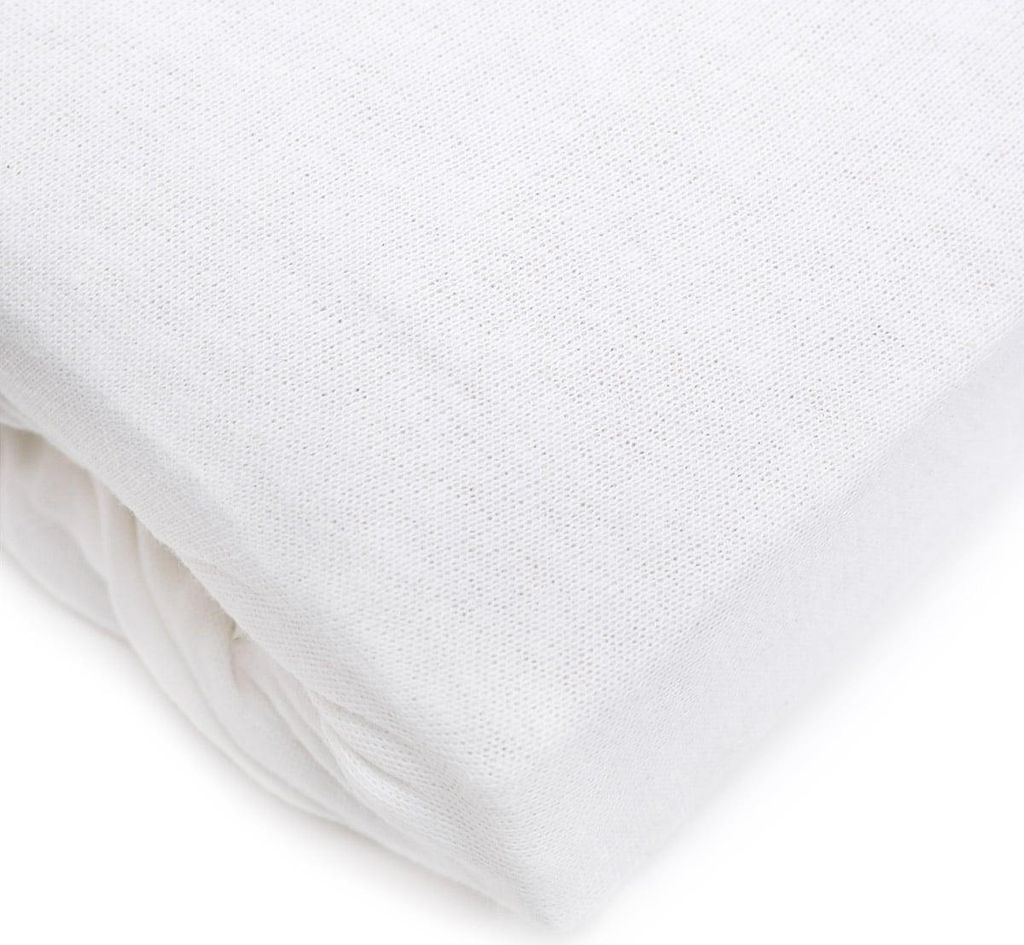 A close-up, folded white jersey bedsheet.