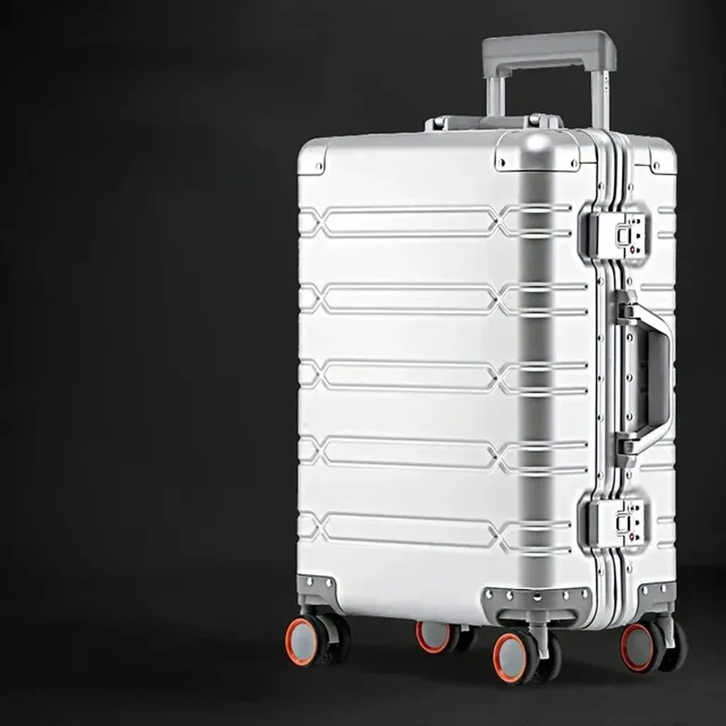 Valise ABS résistante argent 24 pouces : sécurité et mobilité garanties