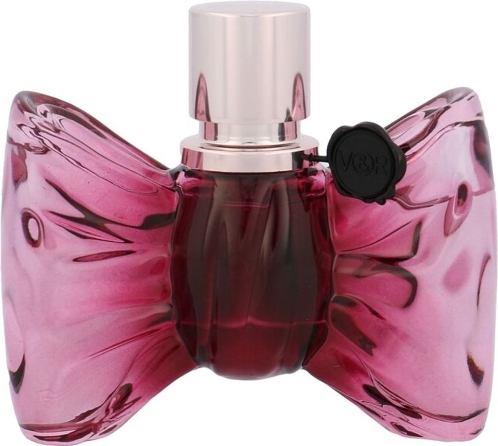 A perfume bottle with a bow-shaped design.