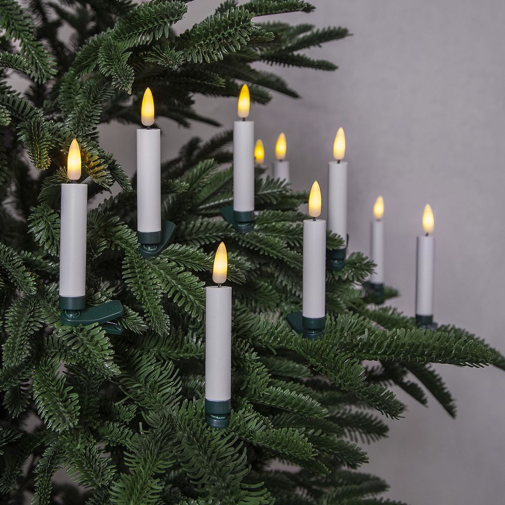 LED candles attached to a Christmas tree.