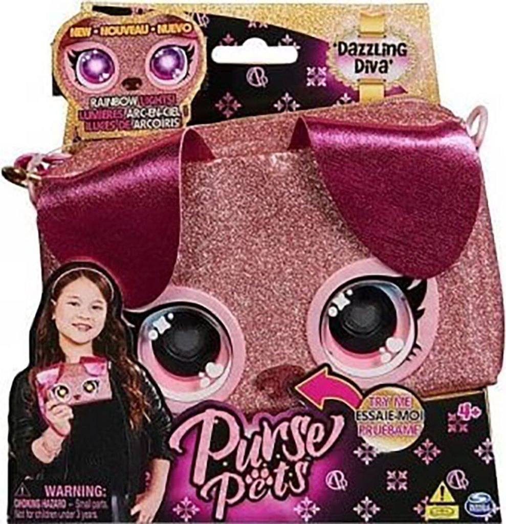 The image shows the packaging of a Purse Pets wristlet toy, featuring a young girl holding a smaller version of the toy.