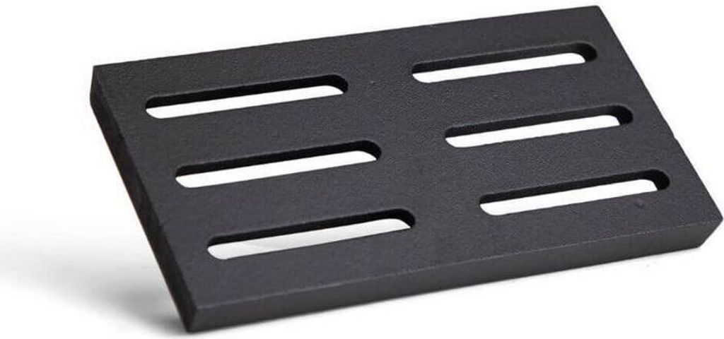 A black cast iron grate with rectangular slots.