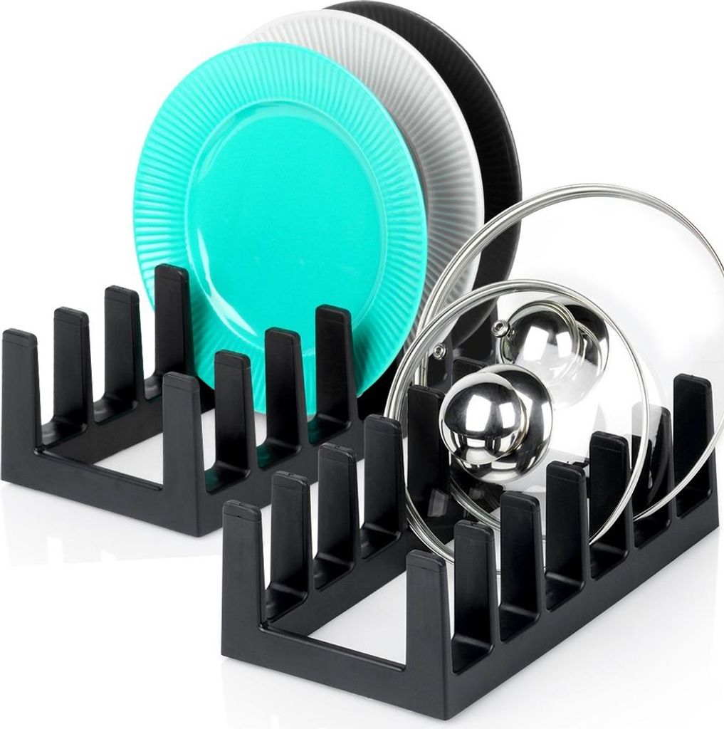 Two black dish racks, one holding turquoise, gray, and black plates, and the other holding pot lids.