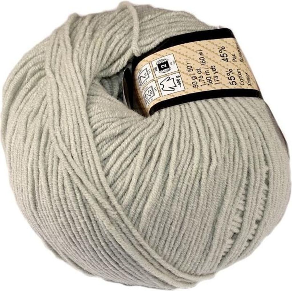 A ball of light gray yarn with a label wrapped around it.