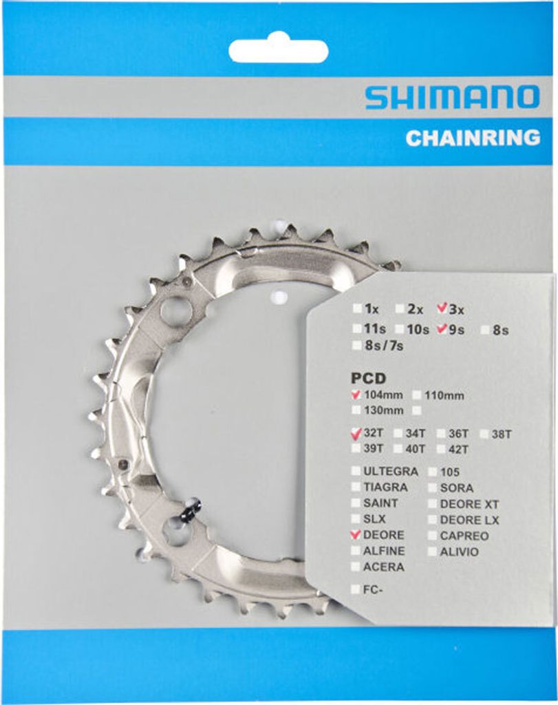 A Shimano chainring is displayed in its retail packaging.
