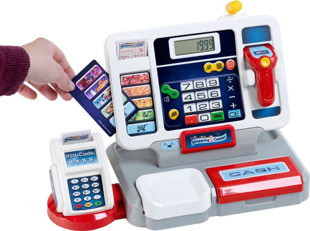 A child's toy cash register with a credit card being inserted.