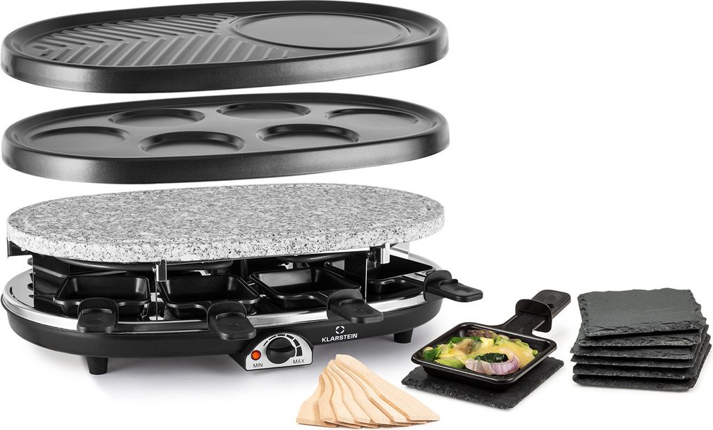 A raclette grill set with multiple cooking surfaces and accessories, displayed against a white background.