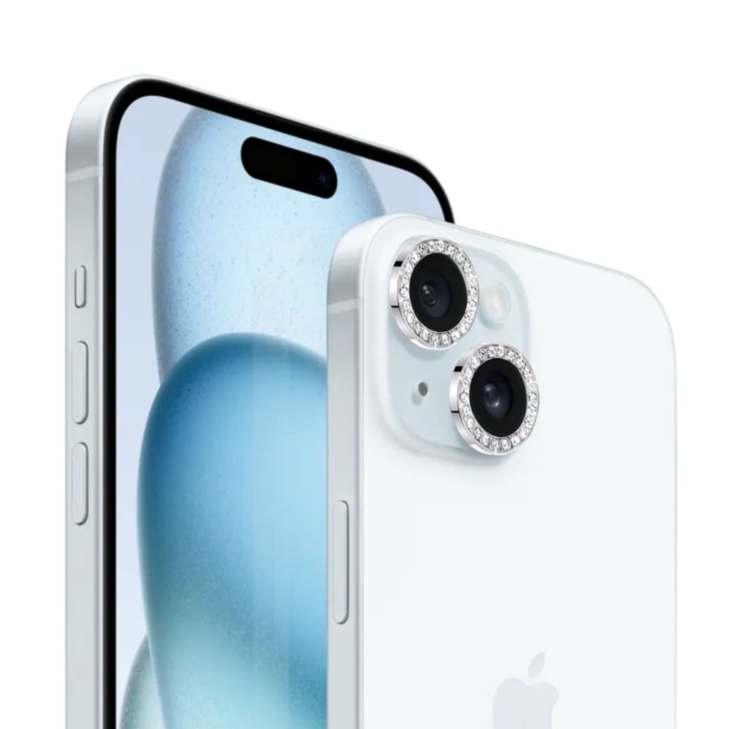 Close-up of a white iPhone with decorative camera lens covers.