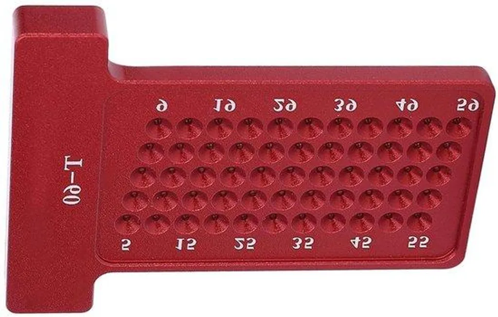 Finis les tracés imprécis avec cette règle en bois rouge à marquage net