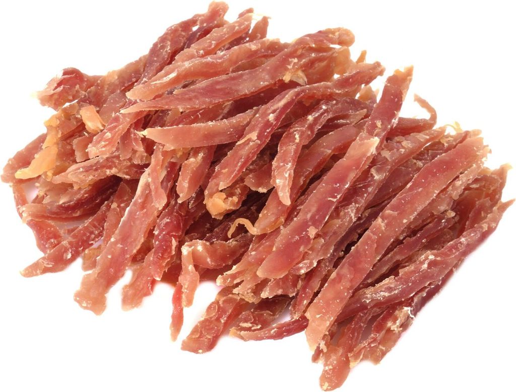 A pile of dried duck jerky strips for dogs, presented on a white background.