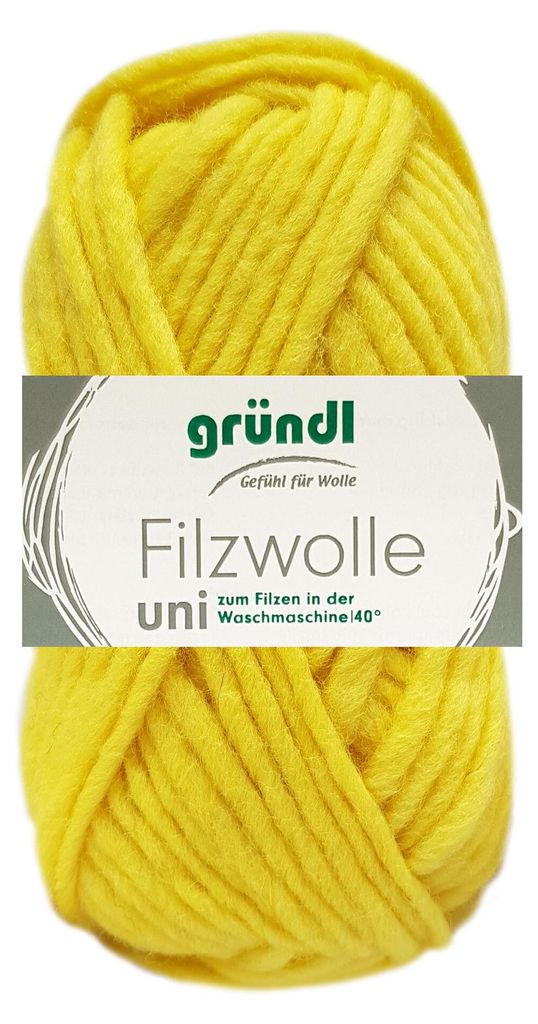 A ball of yellow yarn with a label.