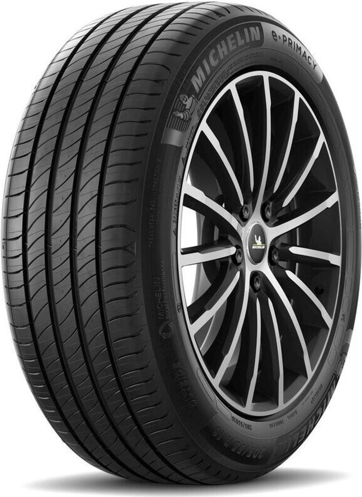 A close-up studio shot of a Michelin E.primacy tire mounted on a black and silver alloy wheel, isolated on a white background.