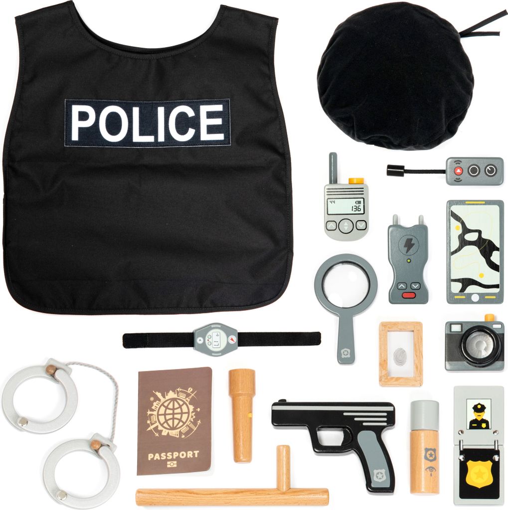 A collection of toy police accessories laid out on a white background.