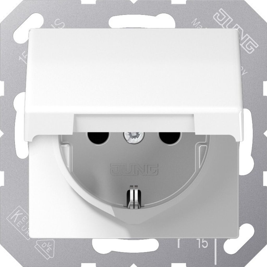 A close-up view of a white electrical outlet with a flip cover, mounted on a metallic plate.