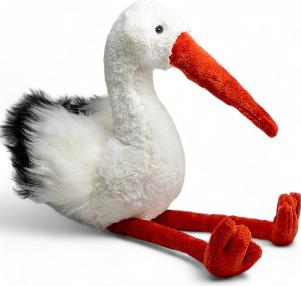 A plush toy stork sitting on a white background.