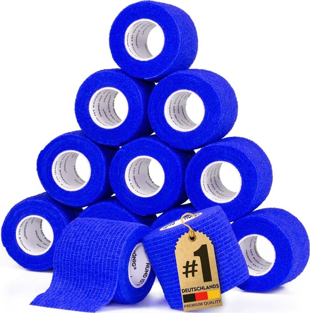A pyramid of blue self-adhesive bandages is stacked against a white background. A tag with a number '1' and German text is attached to one of the bandages in the foreground.