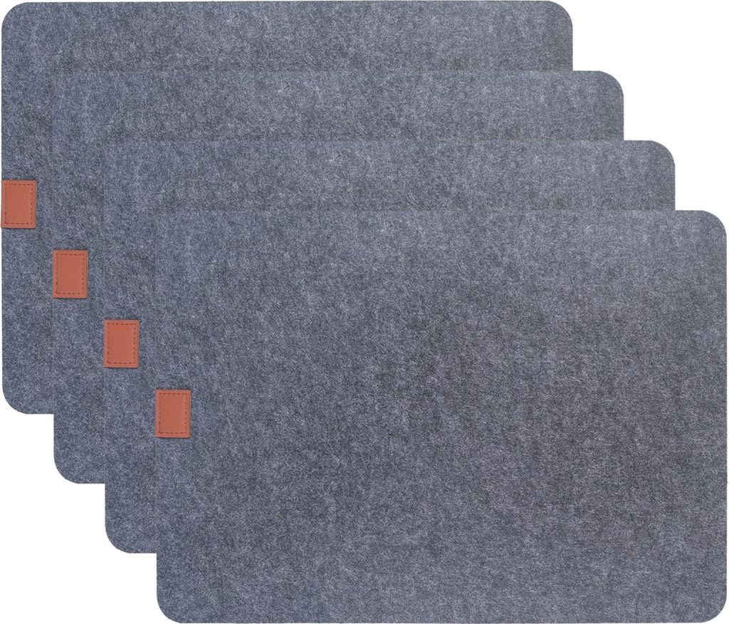A stack of four grey placemats with small brown accents.