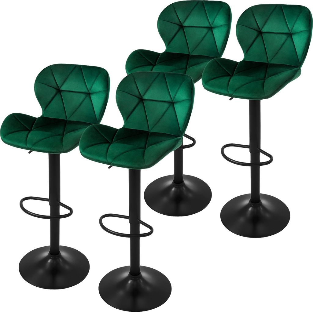 Four green velvet bar stools with black bases and adjustable height.