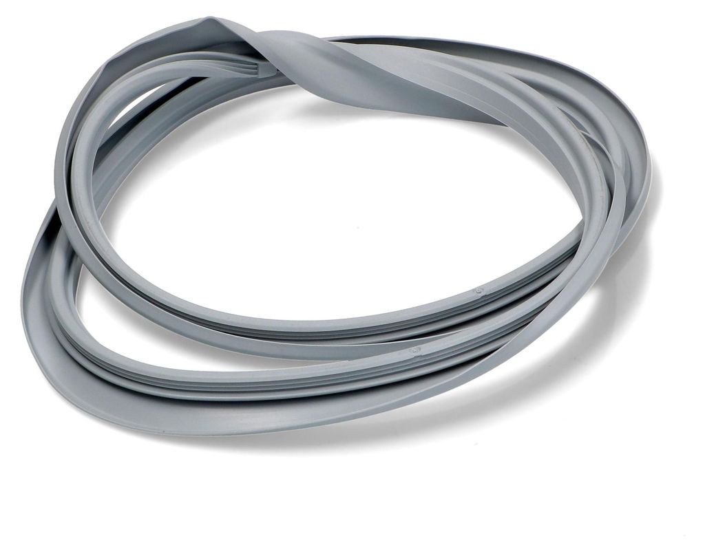 A gray rubber gasket is coiled and lying on a white background.