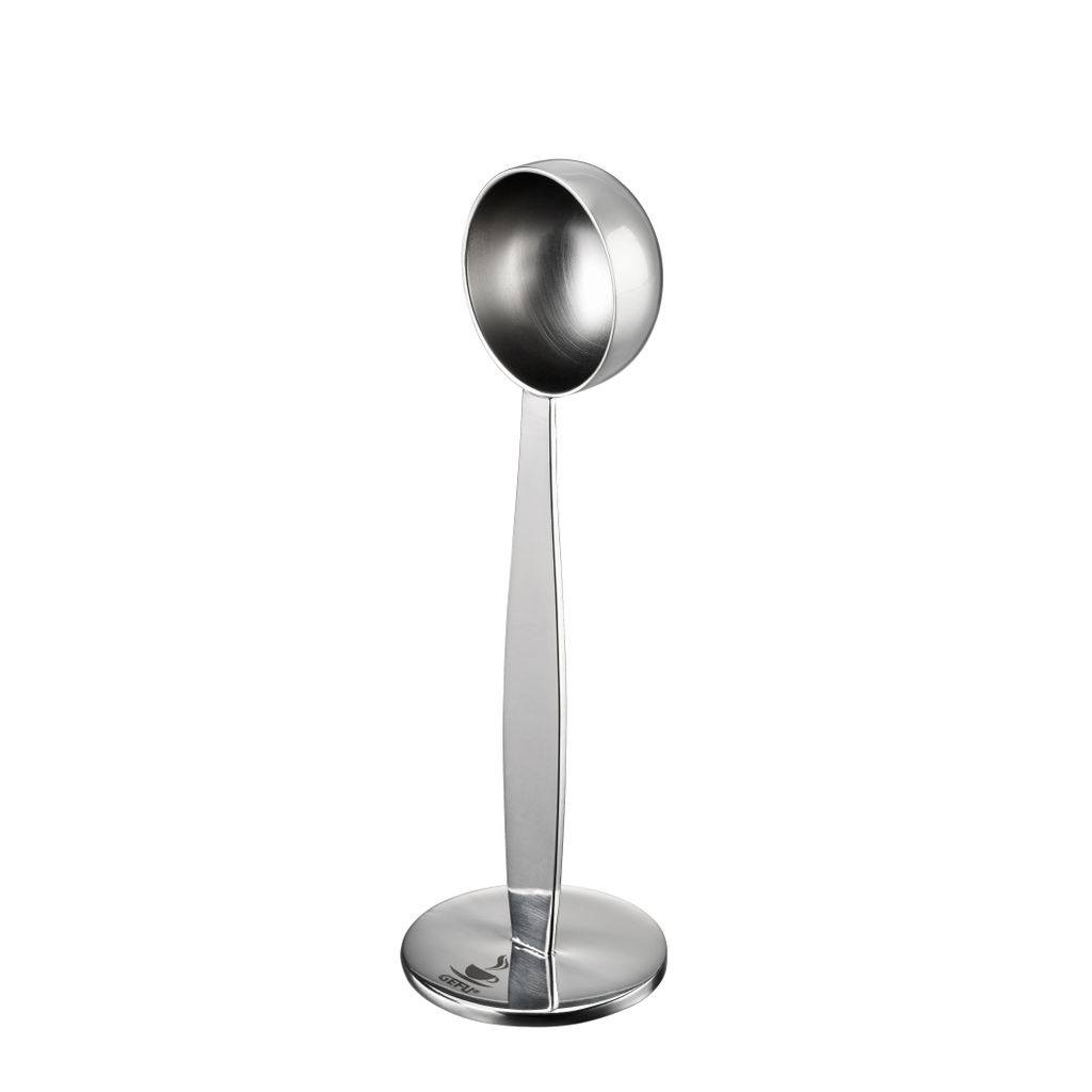 A studio shot of a silver coffee scoop on a white background.