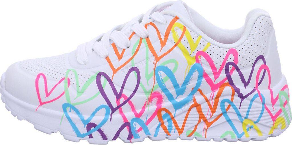 A side view of a white sneaker with colorful heart graffiti.