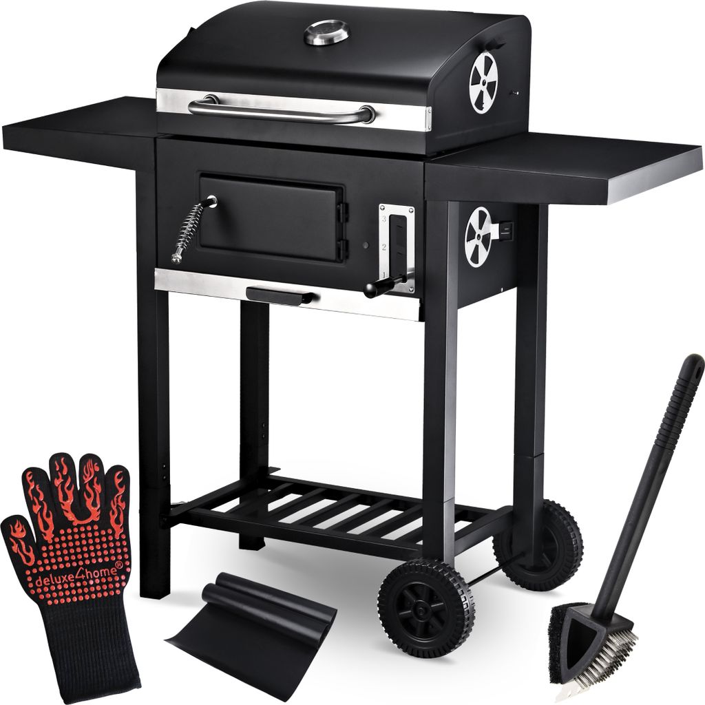 A black charcoal grill with a lid, side shelf, and storage rack, shown with accessories like a glove, mat, and brush.