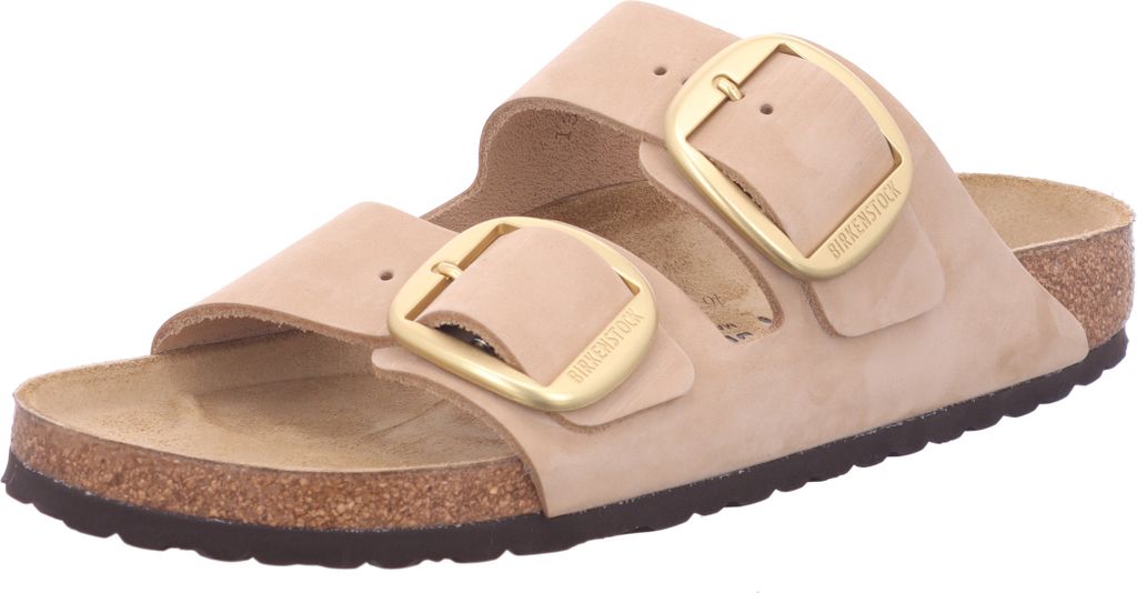 A single Birkenstock sandal with two large gold buckles is shown against a white background.