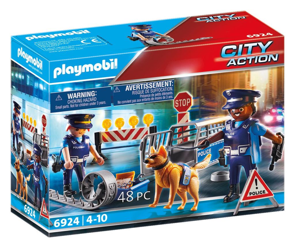 A Playmobil City Action police set packaging showing police figures, a dog, and barricades.