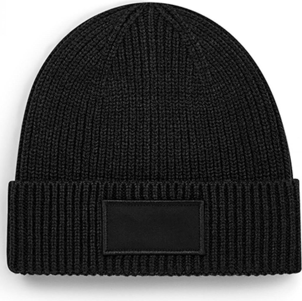 A black knitted beanie with a rectangular patch on the front.