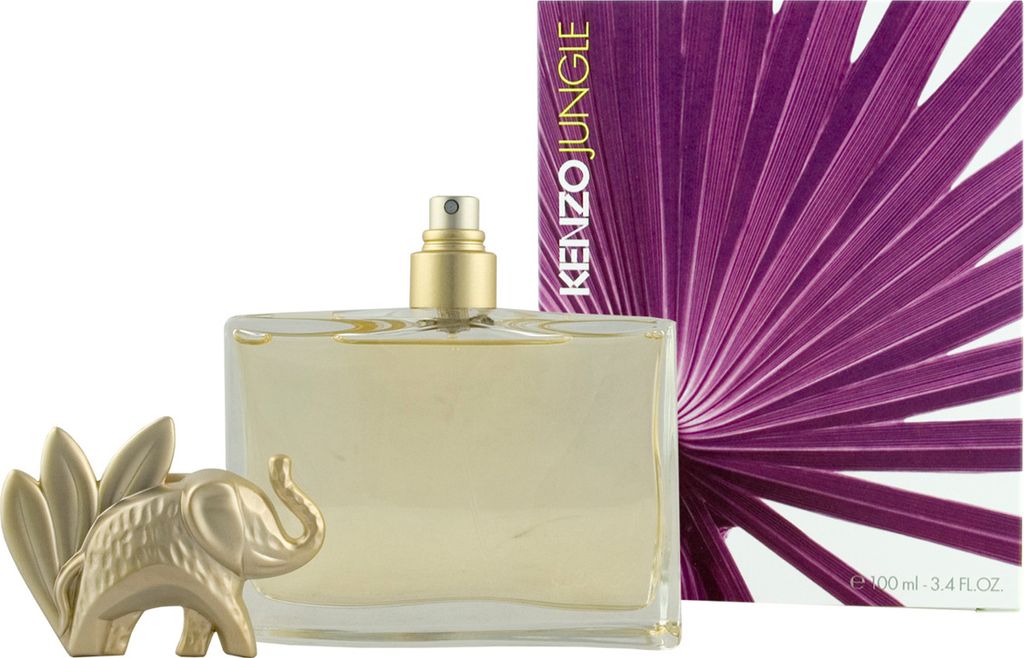 A perfume bottle and its box are displayed against a white background. A small golden elephant charm is placed in front of the bottle.
