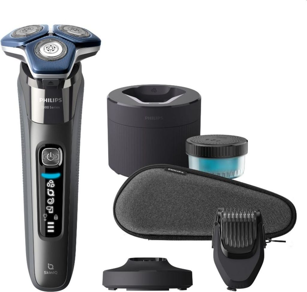 A collection of Philips grooming products, including an electric shaver, charging stand, travel case, and trimmer attachment, displayed against a white background.
