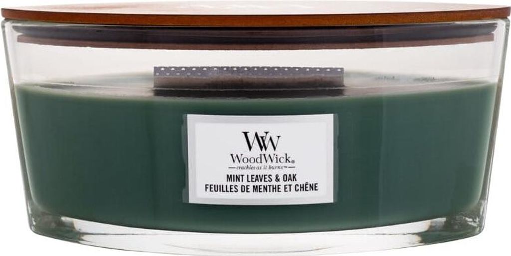 A WoodWick candle with a wooden lid and a label.