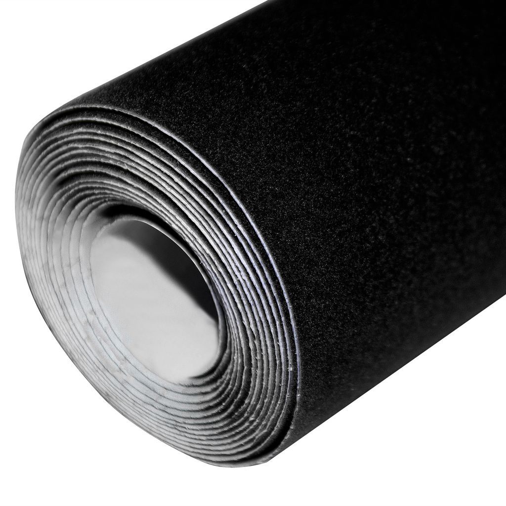 A roll of black velvet fabric is shown from the side.