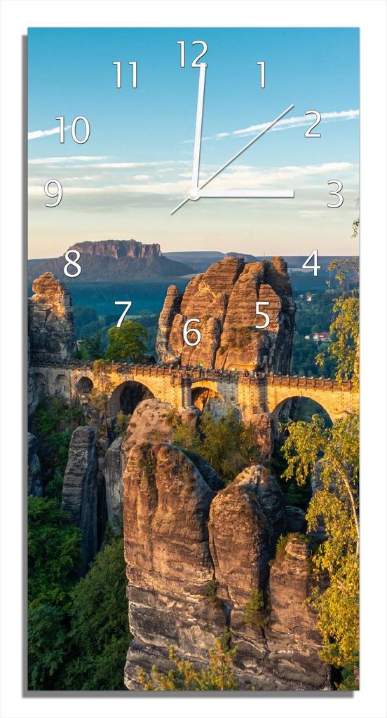 Wallario Design Wanduhr Steinerne Brücke in der Landschaft aus Echtglas, Größe 30 x 60 cm