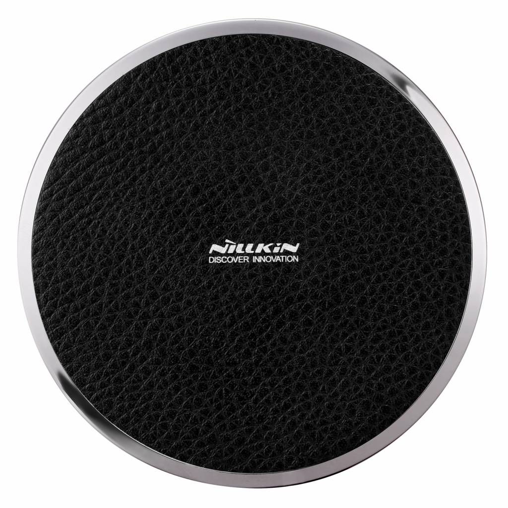 A top-down view of a round wireless charger.