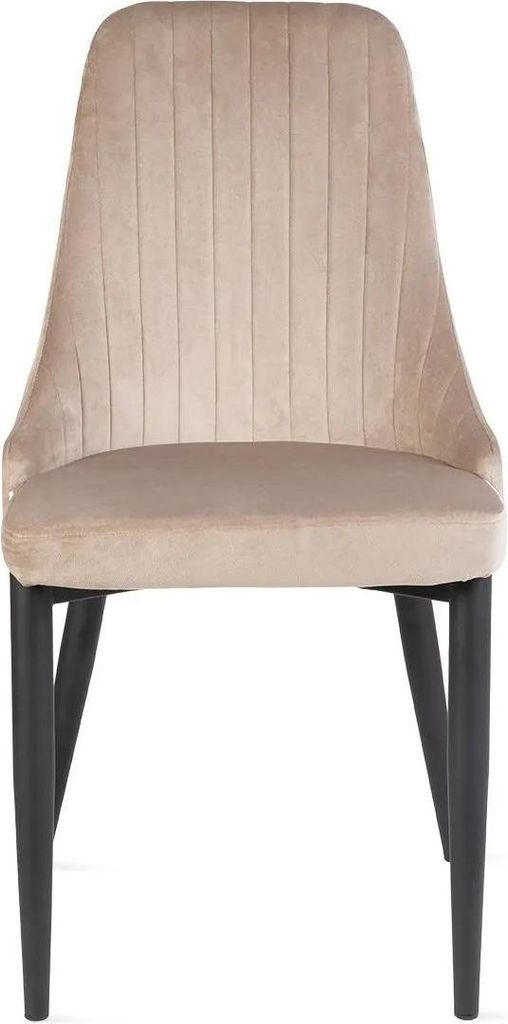 A front view of a beige velvet dining chair with black legs.