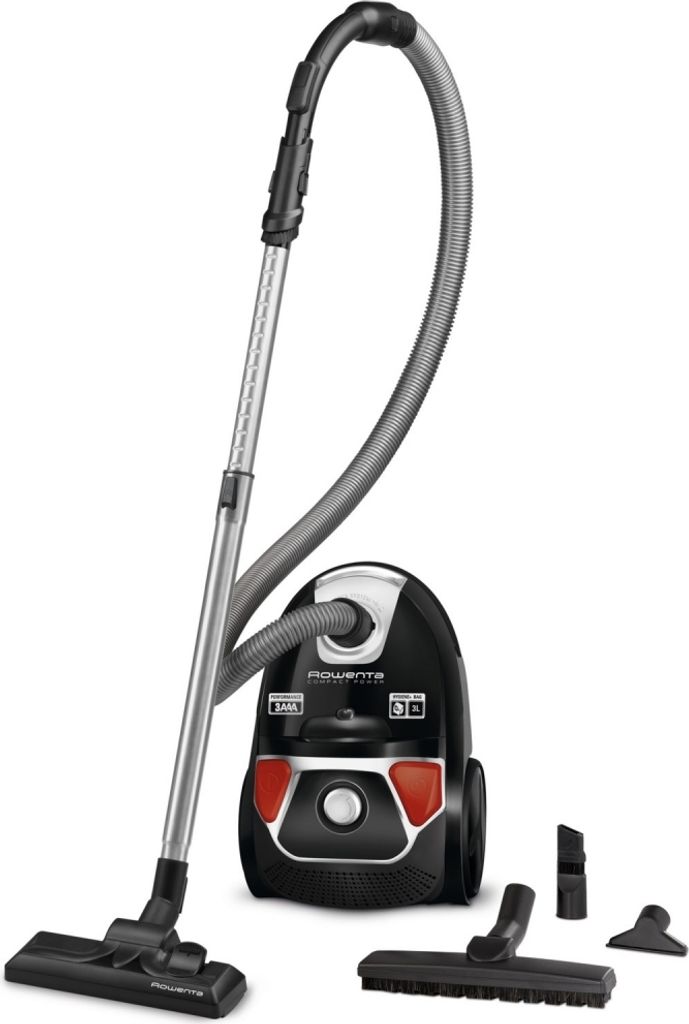 A Rowenta Compact Power RO3955EA cylinder vacuum cleaner with accessories, displayed against a white background.
