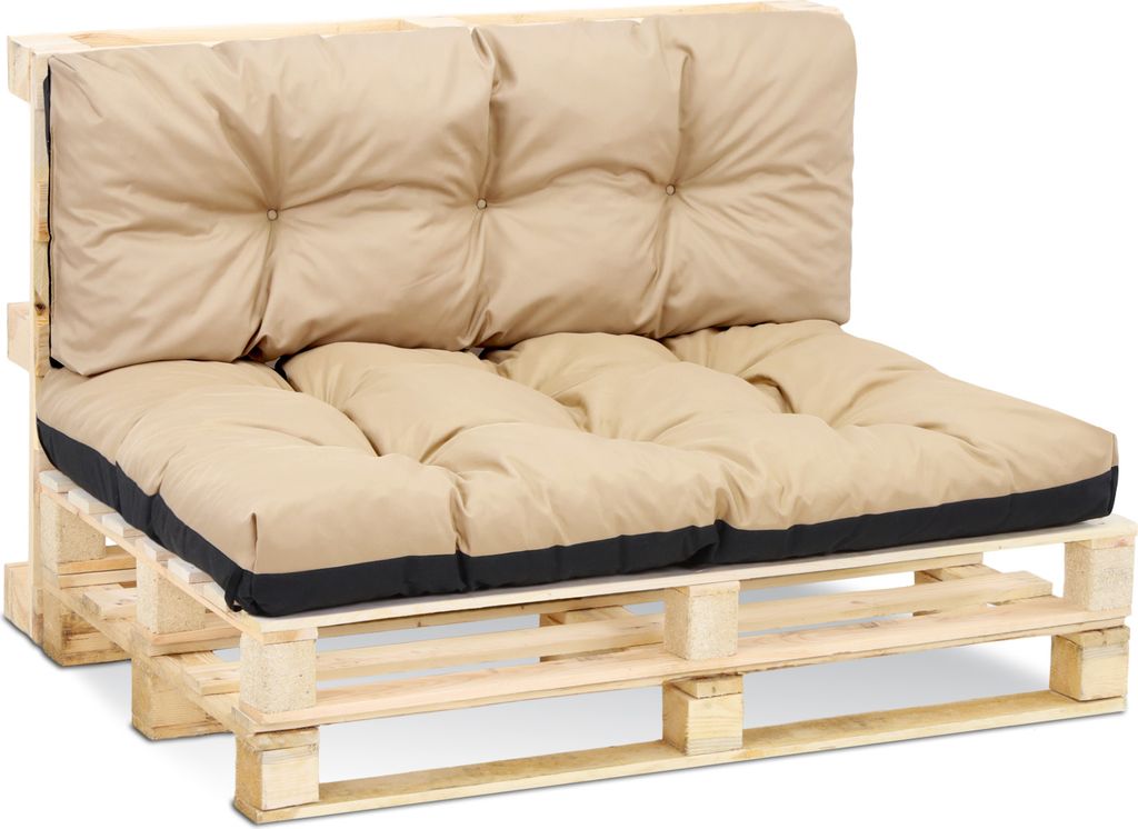 A sofa cushion set on a wooden pallet.