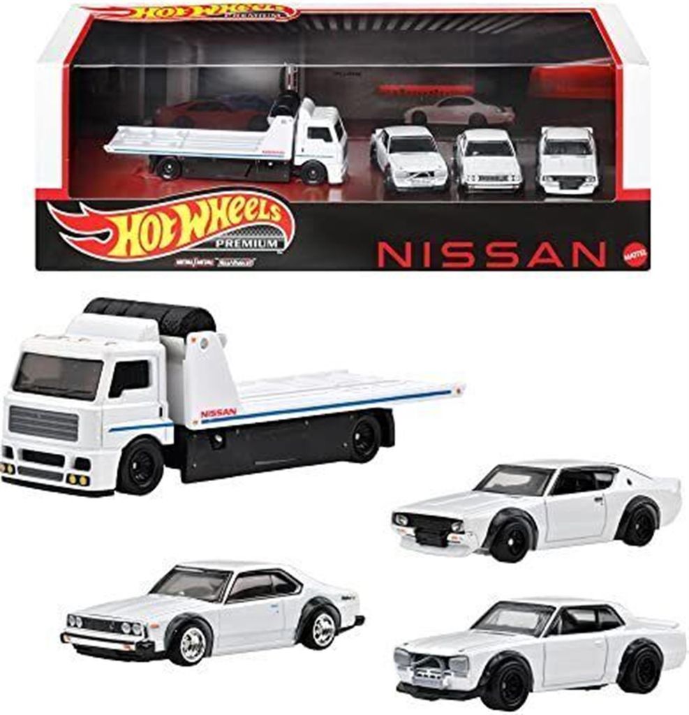 A Hot Wheels Premium Nissan Collector Set with a tow truck and several Nissan Skyline models displayed in packaging.