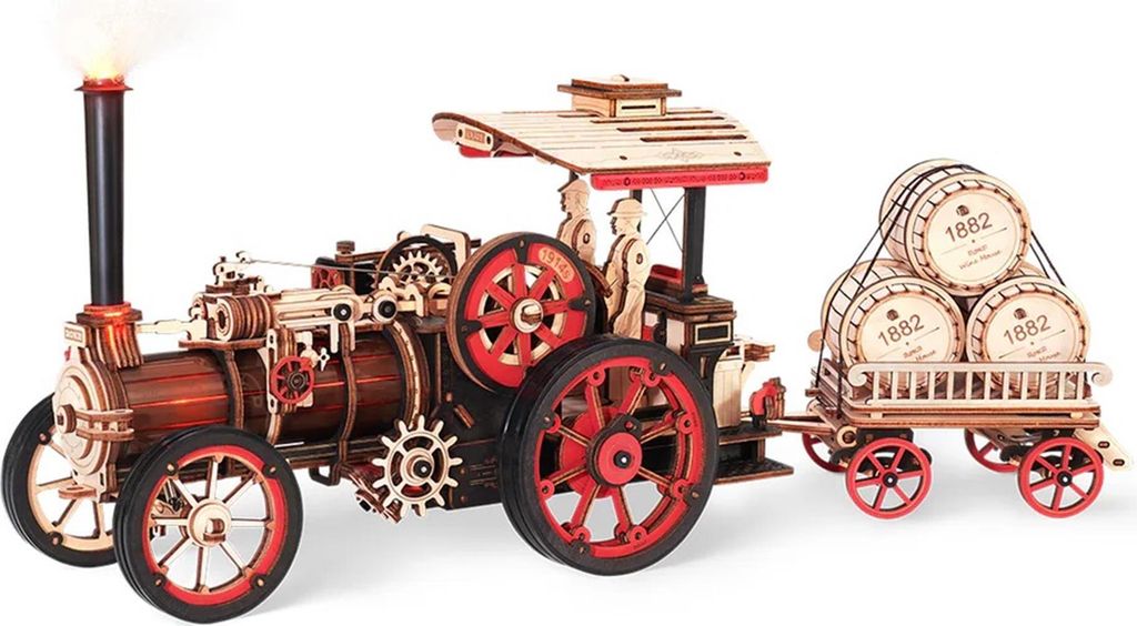 A 3D wooden model of a steam engine with a trailer carrying barrels.