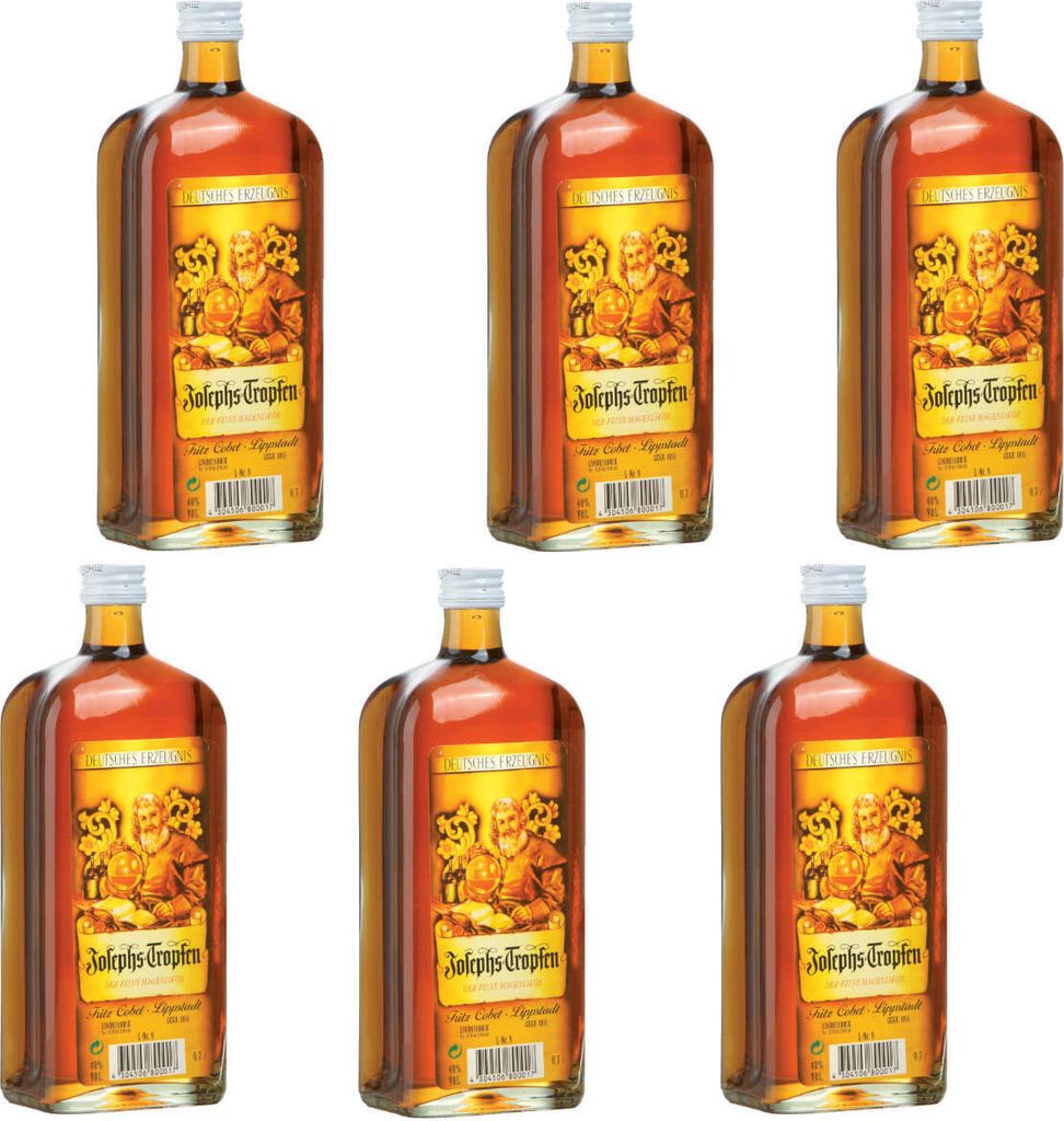 Six bottles of Josephstropfen Kräuterlikör arranged in two rows of three.