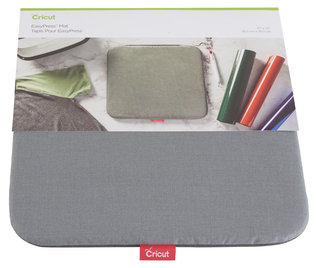 The image shows the packaging of a Cricut EasyPress Mat, with the mat itself partially visible below the packaging.