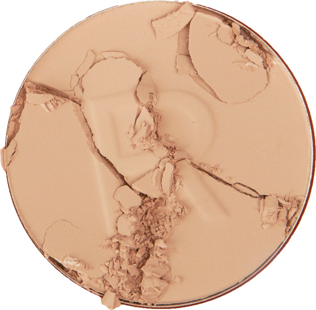 A close-up view of a broken pressed powder compact.